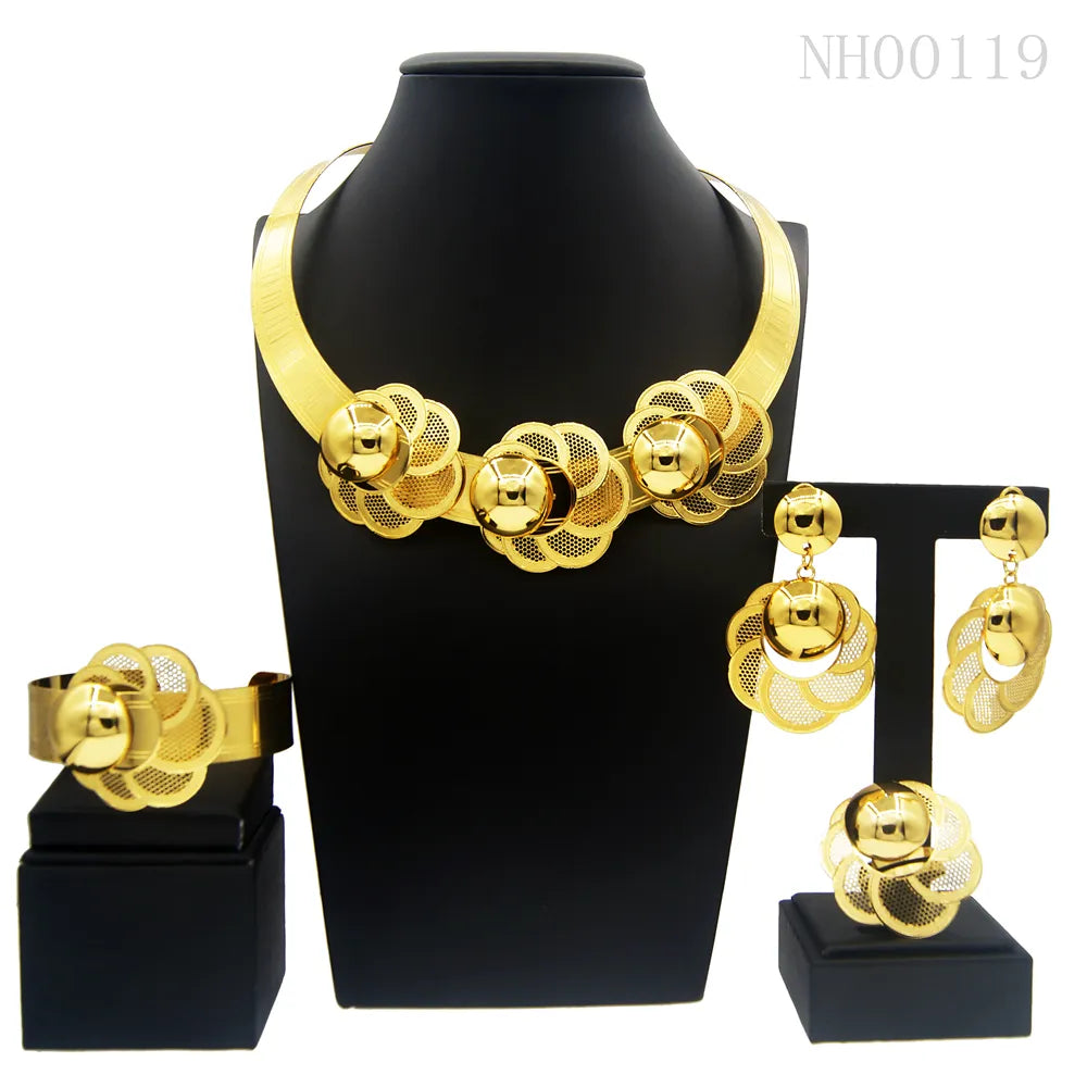 Women's gold tone jewelry set close-up